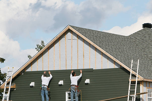 Professional Siding Contractor technician working in Fishertown, PA